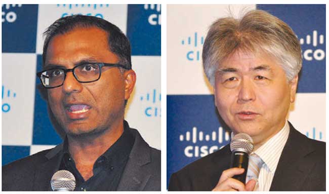 米シスコ AIソフトウェア・プラットフォーム担当バイスプレジデントのDJ サンパス氏（左）、NEC Corporate SVP の山田昭雄氏